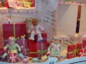 American Girl dolls in window display